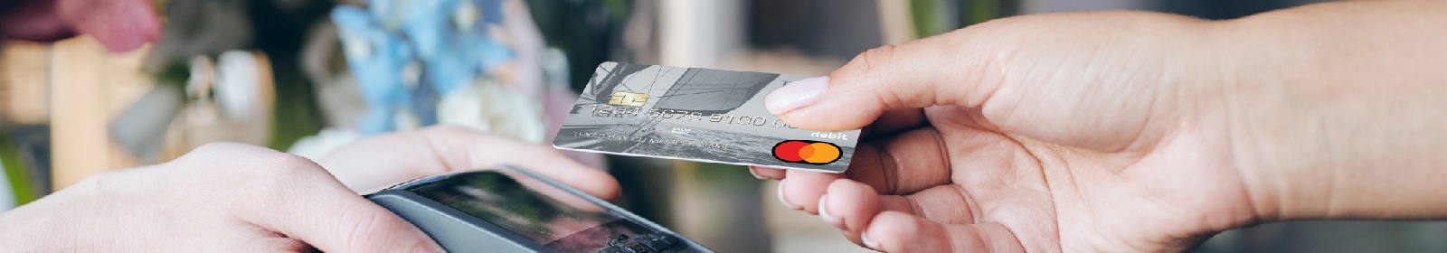 a person making a debit/credit card purchase