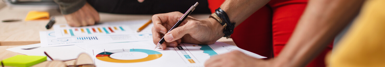 A group of people discussing financial documents